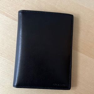 Coach black leather passport holder